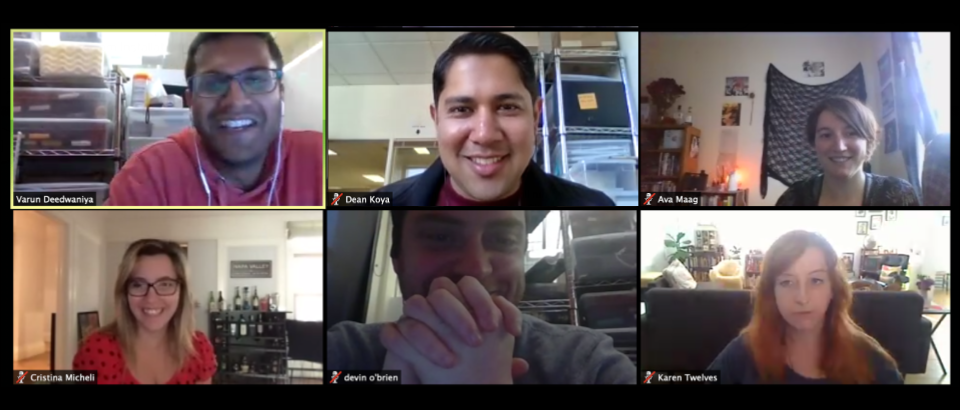 distributed teammates engaged in a lively trivia-based team building activity for remote teams