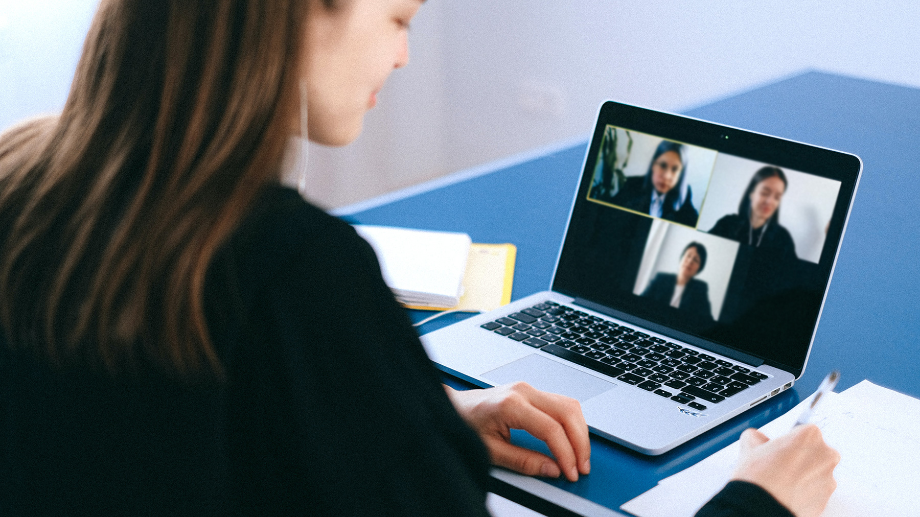 women on a remote team meeting