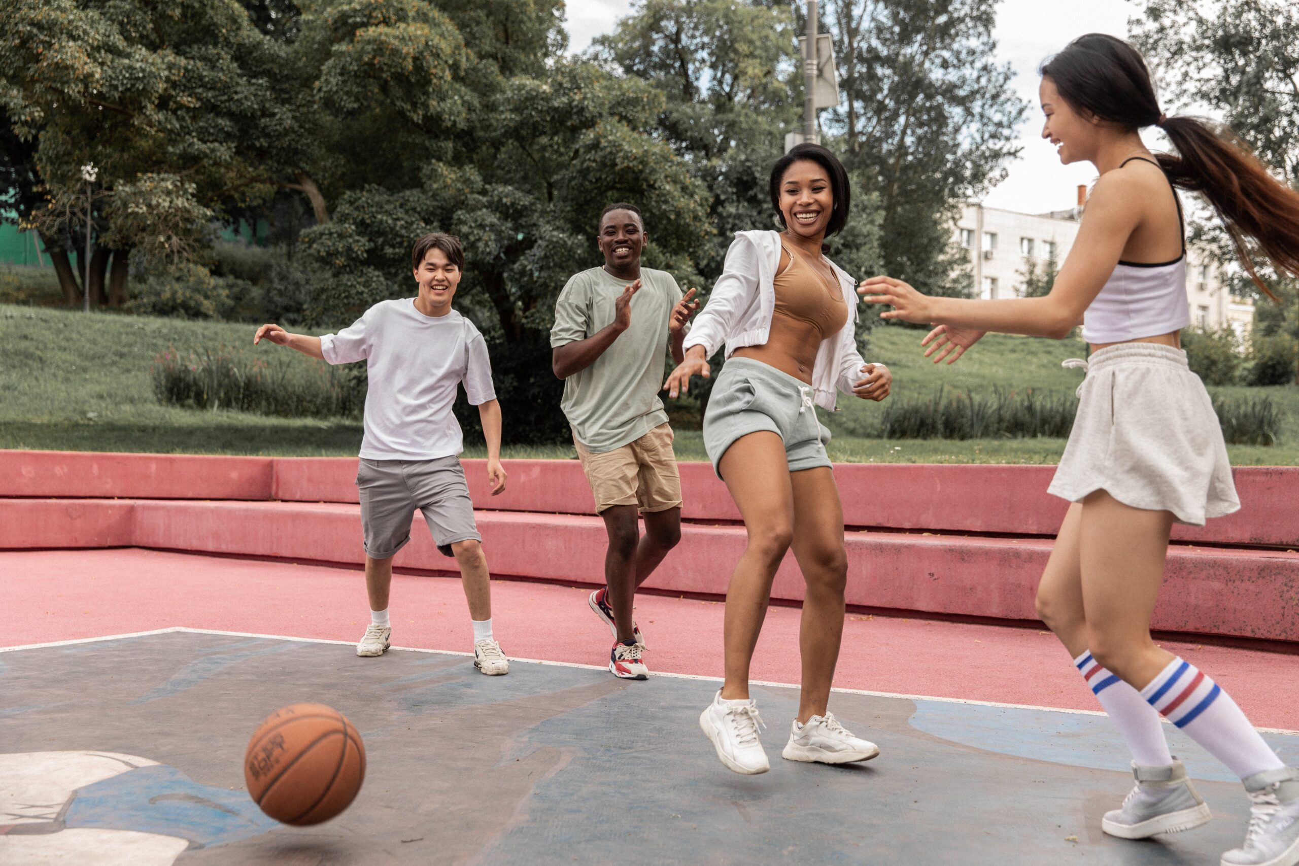 group playing basketball